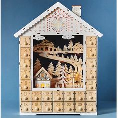 a wooden calendar with a house on it