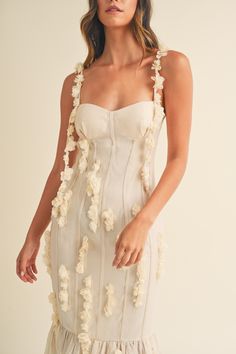 This bestseller is now back in stock! This is the ultimate summer welcome party or rehearsal dinner dress for the bride. Our Camille 3D Floral Bustier Midi Dress is a classic cream midi dress featuring a bustier style top and bodice. But the real wow factor is its playful 3D floral detailing that adds a touch of whimsy to your welcome party or rehearsal outfit. This style is very fitted with no stretch to the fabric. We recommend sizing up if you have larger hips. Also available in pure white. Zimmerman Dress Floral, Bustier Midi Dress, Zimmerman Dress, Party Bottoms, Cream Midi Dress, Miami Dresses, Beautiful Midi Dresses, Dress Lining, Floral Bustier