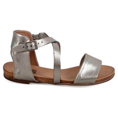 The Miz Mooz Aster sandal features leather straps criss-crossing the instep, and an adjustable buckle closure to provide the perfect fit. All with our signature cushioned footbed and rich, buttery-soft leathers, making them the perfect strappy sandal. Casual Cross Strap Sandals With Buckle, Casual Cross Strap Sandals With Buckle Closure, Spring Cross Strap Footbed Sandals With Adjustable Strap, Silver Open Toe Footbed Sandals With Buckle Closure, Silver Open Toe Footbed Sandals For Spring, Casual Slingback Sandals With Cross Strap And Buckle, Adjustable Leather Sandals With Cross Strap, Adjustable Leather Cross Strap Sandals, Summer Silver Sandals With Leather Footbed