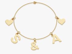 A Letter Charm Bracelet in 14k Gold is a personalized and stylish accessory that holds sentimental value. This bracelet features individual charms crafted from high-quality 14k gold, showcasing a radiant and timeless elegance. The charms are intricately designed in the form of letters, allowing for personalized combinations that can spell out names, initials, or meaningful words. FEATURES • Made to Order • Gold Kt: 14k Solid Gold, 18k Solid Gold • Gold Color: Rose Gold, Yellow Gold, White Gold • Yellow Gold Charm Bracelet, 14k Yellow Gold Charm Bracelet With Dangling Charms, Yellow Gold Charm Bracelet With Dangling Charms, Yellow Gold Charm Bracelet Fine Jewelry, Fine Jewelry Yellow Gold Charm Bracelet, Yellow Gold Fine Jewelry Charm Bracelet, Yellow Gold Charm Bracelet For Gift, Charm Yellow Gold Bracelet Gift, Classic Yellow Gold Charm Bracelet For Gift