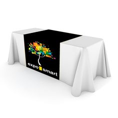 a table with a black and white cover that says expo smart on the front, next to a colorful tree