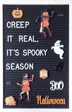 a sign that says creep it real, it's spooky season