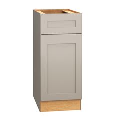 a gray cabinet with wooden drawers on the bottom and one drawer in the middle, against a white background