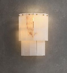 a light that is on the side of a wall with some lights attached to it