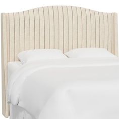 an upholstered headboard with pinstripe on the top and bottom panel