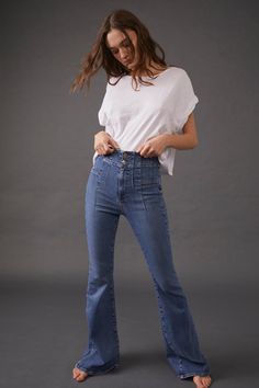 A good fit... Our favorite flare jeans from Free People. These retro-inspired, flattering flares are so comfortable with the stretch fabric and super high rise. Do your backside a favor and put them in these top-rated pants. Features: Women's denim flare jeans Button closure Exaggerated yoking Semi-stretch fabrication Super high-rise flared silhouette Materials/Care: 2% Elastane, 7% Polyester, 91% Cotton Machine washable Gauze Pants, Denim Flare Jeans, Jeans Button, Denim Flares, Indigo Blue, Summer Sale, Retro Inspired, Denim Women, Bell Bottom Jeans