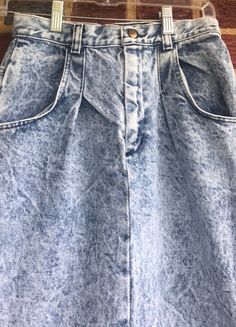 "Vintage Carlyle 80s High Waisted Acid wash denim skirt.Even though labeled a size 7 please pay attention to measurements true vintage. Top waist 12 1/2\"/hips 16\"/ length 29\"/split 10\"/Good 80s condition no issues/smoke free environment(135)" Vintage Blue Denim Skirt, Vintage Medium Wash Skirt With Pockets, Vintage High-rise Dark Wash Denim Skirt, Vintage High Rise Dark Wash Denim Skirt, Vintage Denim Skirt With Pockets, Vintage High-waisted Dark Wash Denim Skirt, Vintage High Waist Dark Wash Denim Skirt, Vintage High Rise Denim Blue Skirt, Vintage High-waist Dark-wash Denim Skirt