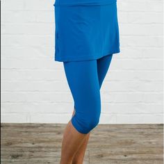 Brand New Never Worn Still In Package. Royal Blue 82% Nylon 18% Spandex - Upf 50+ Sun Protection - High Waisted: Wide Waistband Sits Just Below Your Natural Waist For Slenderizing Tummy Control - Capri Length Leggings Hit Below The Knee - Attached Skirt Hits Mid High Thigh, Specially Designed For Coverage. - Inseam Length 17.4” (Size S) - Skirt Length 12.2” (Size S) Sporty Stretch Blue Swim Skirt, Blue Swim Skirt With Built-in Shorts For Workout, Blue Stretch Swim Skirt For Sports, Blue Stretch Swim Skirt Casual Style, Blue Stretch Casual Swim Skirt, Blue Compression Bottoms With Built-in Shorts, Casual Blue Stretch Swim Skirt, Blue Elastane Activewear For Spring, Blue 4-way Stretch Activewear Shorts