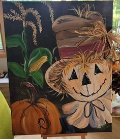 a painting of a scarecrow and pumpkins