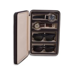 Your favorite accessories deserve nothing less than luxury when you travel. Crafted from beautiful leather with contrast stitching and scratch-resistant velour lining to keep your watches and glasses safe and smudge-free. A thoughtful gift for the frequent traveler, add a classic monogram for a personal touch.    11.25"l x 7.25"w 2.25"h  Genuine leather with soft, scratch-resistant velour lining.  Fits 2 watches and 2 pairs of glasses.  Wipe with a soft dry cloth.  Imported.  Monogramming is las Watch Safes, Personalized Sunglasses, Eyeglass Case, Eyewear Accessories, Glasses Case, Gift Accessories, Watch Case, Monogram Initials, Travel Case