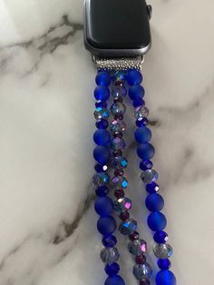 Royal blue, deep purple and a grayish silver Apple Watch Band. Fits series 7/6/5/4/3. Size M/L 38-42. Modern Blue Adjustable Apple Watch Band, Modern Adjustable Blue Apple Watch Band, Adjustable Blue Bracelet Strap Apple Watch Band, Adjustable Blue Bracelet Strap Watch Band, Modern Blue Watch Bands As A Gift, Silver Apple Watch Band, Silver Apple Watch, Silver Apple, Band Fits