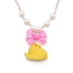 "This necklace is so kawaii and realistic, perfect for Easter or the entire Spring season and makes a great gift for a daughter, friend or any woman in your life who loves cute charm jewelry! Comes in a free pink gift box. This listing is for one necklace. Matching earrings in my shop: https://etsy.com/shop/fatallyfeminine I handmade these super cute yellow faux marshmallow chicks from polymer clay and added a realistic sugar-like texture.  Details: 1x1.25\" (2.5x3.13 cm) yellow chick hangs below a pink and white 1\" (2.5 cm) polka dot bow. Necklace comes in your choice of gold or silver finish. 18\" in total length. Accented with glass pearls and closes with a lobster clasp.  **Made to order - may take up to 2 weeks to make before shipment** Every order comes with free gift packaging! Ple Kawaii Necklaces For Valentine's Day, Cute Yellow Necklace For Gifts, Cute Yellow Necklace For Gift, So Kawaii, Cute Marshmallows, Pastel Candy, Pink Gift Box, Easter Jewelry, Bow Bow