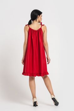 "A red summer dress is featuring loose silhouette, shoulder ties, and a ruffled bottom. - halter neck with ties - midi length - lose dress - ruffled bottom - side seam pockets Color: red Fabric: cotton - 100% For Size S (6 US): length - 39\" (100 cm) Our model wears size S (US 6) and is 171cm/5'6\" tall. MORE DRESSES: https://www.etsy.com/shop/TAVROVSKA?ref=hdr_shop_menu SIZE CHART XS | EU 34 | US 4 bust: 31,5\" | 80 cm waist: 24,5\" | 62 cm hips: 34,5\" | 88 cm S | EU 36 | US 6 bust: 33,0\" | 8 Lose Dress, Plus Size Sundress, Red Summer Dress, Sundress Summer, Red Summer Dresses, Cotton Sundress, Vacation Dress, Vacation Dresses, Style Expert