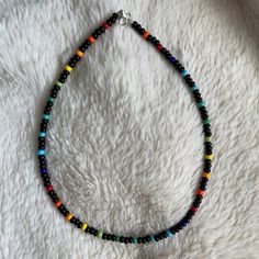 Night Lights Beaded Choker Beach Choker Seed Bead Necklace - Etsy UK Black Beaded Necklaces With Spacer Beads For Beach, Black Heishi Beads For Beach, Black Beaded Necklaces For Beach, Black Beaded Necklace For Beach With Tiny Beads, Beach Black Beaded Necklace With Tiny Beads, Black Necklaces With Colorful Beads For Beach, Rainbow Heishi Beads For Festival, Black Beaded Heishi Beads Necklace, Casual Black Beaded Choker Necklace