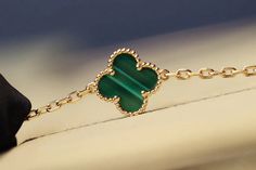 Indulge in the opulent elegance of our CLOVER 20 MOTIFS MALACHITE DIAMOND GOLD NECKLACE. Crafted with 20 stunning motifs adorned with malachite and diamonds, this necklace exudes luxury and sophistication. Elevate any outfit with this exclusive piece that embodies the beauty of art and fashion. ADDITIONAL INFORMATION Color: Gold Stone: Malachite, Cubic Zirconia Ref. vcarp34806 Material:- 925 Sterling Silver - 18k Gold Plated- 18k Real Gold ( contact us via instagram) Length of chain : 84cm Our r Elegant Gold Jewelry With Gemstone, Elegant Yellow Gold Jewelry With Jewels, Elegant Green 14k Gold Necklace, Elegant 14k Gold Necklaces With Jewels, Elegant 14k Gold Jeweled Necklaces, Elegant 14k Gold Necklace With Jewels, Elegant 14k Gold Jeweled Necklace, Luxury Plated Necklaces For Formal Occasions, Elegant Green Plated Jewelry