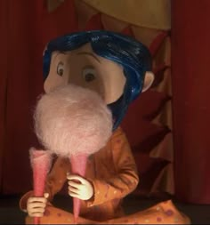 a close up of a person with a fake beard and blue hair holding a pink object