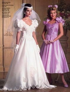 two women in wedding gowns standing next to each other on the cover of a magazine