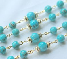 Turquoise is a healing stone, a stone of protection and a symbol of friendship. It is perhaps the oldest stone in man's history. I selected this beautiful pairing of natural turquoise and gold accents to create this stunning First Holy Communion rosary. I used top quality turquoise in both 6mm for the Ave beads, and 8mm for the Pater beads. Surrounding each Pater is a pair of Swarovski gold clear crystal rondelles as well as 4mm Swarovski crystal bicones. The gold center is a chalice with beauti Friendship Symbols, Silver Gift Box, Turquoise And Gold, First Holy Communion, Old Stone, Christian Jewelry, Holy Communion, Healing Stone, Natural Turquoise