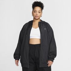 With a classic sport look and a lightweight feel, this jacket is ready for whatever the day throws at you. Dropped shoulders and an oversized fit gives you a casual feel that you can rock all day. Oversized Black Windbreaker With Double-lined Hood, Relaxed Fit Athleisure Hooded Jacket, Oversized Sports Track Jacket, Oversized Long Sleeve Track Jacket For Sports, Nike Oversized Long Sleeve Activewear, Casual Moisture-wicking Hooded Jacket For Fall, Sporty Relaxed Fit Hooded Jacket For Streetwear, Sporty Hooded Jacket With Relaxed Fit, Sporty Relaxed Fit Hooded Jacket