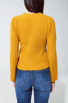 Embrace comfort and style with our Cozy Mustard Yellow Chunky Ribbed Jumper, a versatile addition to your wardrobe that's perfect for various occasions. Vibrant Mustard Yellow Color: Brighten up your day with the sweater's eye-catching mustard yellow hue, a color that complements a wide range of skin tones and adds a cheerful touch to any outfit. Comfortable Chunky Ribbed Knit: Crafted from a cozy blend of 74% Acrylic, 22% Polyester, and 4% Elastane, this jumper offers both warmth and comfort, m Versatile Ribbed Sweater For Fall, Long Sleeve Chunky Knit Top For Work, Chunky Knit Long Sleeve Tops For Work, Snug Ribbed Tops For Fall, Yellow Soft Knit Tops For Fall, Chunky Knit Top For Winter Workwear, Winter Chunky Knit Tops For Work, Soft Knit Yellow Top For Winter, Versatile Ribbed Sweater For Work