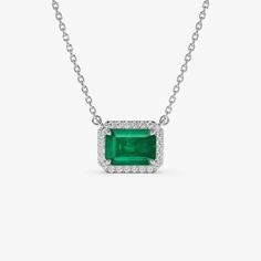 Gold Kt: 14K (also available in 18K) Available Gold Color: Yellow Gold Length and Width: 9.8 X 7.70 MM Round Diamonds: 24 PC 1.0 MM Octagon Emerald: 1 pc 7 x 5 MM Emerald Carat Weight: 1.02 ctw Diamond Carat Weight: 0.12 ctw Emerald Cut Platinum Gemstones In White Gold, White Gold Gemstone With Emerald Brilliant Cut, Emerald Cut Diamond Fine Jewelry, Gia Certified Octagon White Gold Jewelry, White Gold Emerald Cut Gemstones With Prong Setting, Gia Certified Emerald Cut Diamond Necklace, Gia Certified Emerald Cut Fine Jewelry Necklaces, Gia Certified Emerald Cut Necklace, Gia Certified Emerald Cut Necklaces