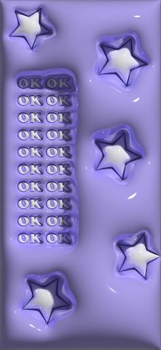 the chocolate molds are shaped like stars and have white letters on purple frosting