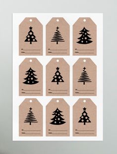 six tags with christmas trees on them