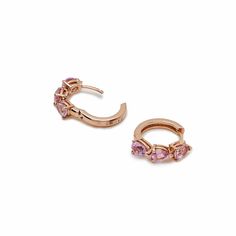 Everyone needs a perfect hoop earring to take them from the office to dinner plans to weekend brunch with friends. The Pear-Shaped Pink Sapphire Huggies are just that versatile fine jewelry staple. Crafted in 18-karat rose gold, these huggie hoop earrings are anything but basic, featuring bold pear-shaped pink sapphires totaling 2.11 carats. Details18K Rose Gold2.11 Carats of Pear-Shaped Pink SapphiresManufactured in Italy Pink Formal Hoop Earrings In Fine Jewelry Style, Elegant Pink Hoop Earrings, Pink Hoop Earrings For Formal Occasions, Elegant Pink Hoop Earrings With Prong Setting, Elegant Pink Gold Hoop Earrings As Gift, Elegant Pink Gold Hoop Earrings For Gift, Elegant Pink Gold Hoop Earrings, Elegant Pink Beaded Hoop Earrings, Elegant Small Pink Hoop Earrings