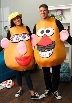 two people in costumes standing next to each other