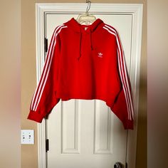 Adidas Cropped Hoodie Bought Direct From Adidas To Wear With Pants. Jacket I’m Xl Wasn’t Available So Bought The Matching Hoodie. Pants Are Too Big So Selling Pants Also. Later Found Jacket In Men’s Size But Selling Jacket Also Since Pants Are Too Big. This Scarlet Red Color Pops! Bundle & Make An Offer Red Hooded Sporty Sweater, Red Fleece Sporty Sweater, Red Hooded Fleece Sweater, Sporty University Red Hoodie Sweatshirt, University Red Sporty Hoodie Sweatshirt, Sporty Red Sweater For Streetwear, Red Hooded Sweater For Streetwear, Red Fleece Athleisure Hoodie, Red Fleece Hoodie For Athleisure