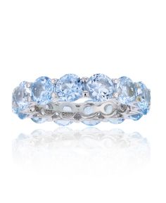 Bold in design, this eternity ring features a paved setting with sparkling 105 created spinel stones. Sky Blue Rings, Blue Eternity Ring, Light Blue Rings, Masquerade Quince, Light Blue Ring, Light Blue Jewelry, Light Blue Quince, Bd Ideas, Quince Stuff