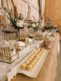 a table filled with lots of desserts and pastries