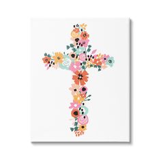 a cross with flowers painted on it in pink, orange and blue colors is shown