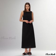 Olivia Mark - Chic Solid Color Sleeveless Dress with Loose Fit and Round Neckline in Cotton Linen Blend Casual Black Sleeveless Maxi Dress, Casual Black Sleeveless Dress For Daywear, Black Sleeveless Dress For Daywear, Black Sleeveless Midi Dress For Daywear, Sleeveless Black Midi Dress For Daywear, Black Sleeveless Daywear Dress, Sleeveless Black Daywear Dress, Brown Outfit, Home Dress