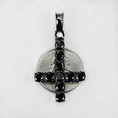 Gorgeous Mens upside down Cross on tennis chain.
Man made black diamonds
Oxidized solid 925 sterling silver! Will NEVER tarnish or change colors
Chain is 4mm wide and we have all lengths from 18-30"
Chain weighs 40-70 grams depending on length an is 70-100 carats 
Pendant is about 6 grams and has 10 carats...measures 1" by 1.75"
This is truly a stunning piece and can be worn as a short choker or a longer chain!
This would also look dope as a combo with a Black Round Jewelry For Streetwear, Black Stainless Steel Jewelry For Streetwear, Upside Down Cross Jewelry, Black Cubic Zirconia Jewelry With Polished Finish, Black Diamond Cross Necklace, Black Cross Pendant Jewelry With Silver Chain, Black Sterling Silver Cross Pendant Necklace, Black Nickel-free Cross Pendant Jewelry, 10k Gold Chain