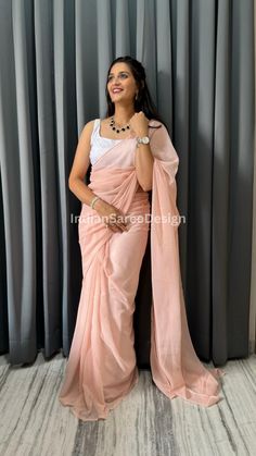 Plain bolloywod style peach colour georgette saree with backless stiched blouse, indian saree for women Product Details Saree Fabric: Georgegette Blouse Fabric: Georgette and net Saree Length: 5.5 meters Blouse Length: 1 meter  Colour: Peach and white Note: Blouse will be customized as per your measurements. Type:- 4 Step Saree Draping Shipping Your parcel will be dispatched within 48 hours of ordering. After dispatch, your parcel will be delivered in 4-5 days. Peach Georgette Saree With Traditional Drape, Peach Semi-stitched Saree For Party, Peach Georgette Saree With Unstitched Blouse, Elegant Peach Georgette Saree, Festive Peach Georgette Pre-draped Saree, Blouse Indian Saree, Peach Color Saree, Blouse Indian, Peach Colour