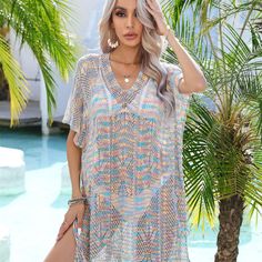 Embrace the Summer Vibe with Our Sexy Bohemian Lace Beach Cover-Ups Hello, my dear fairies! Get ready to turn heads and make a statement at the beach with our stunning Sexy Summer Bohemian Lace Beach Cover-Ups. Perfect for any summer outing, these cover-ups are designed to bring out your inner goddess, ensuring you look and feel your best. Whether you're lounging by the pool or strolling along the shore, our lace cover-ups are the ultimate addition to your summer wardrobe. Product Features Material: Made from high-quality rayon and microfiber, ensuring a soft and comfortable feel against your skin. Design: Features a beautiful lace and crochet design, adding a touch of elegance and femininity. Pattern: Striped pattern for a chic and trendy look. Style: Bohemian beach style that is perfect Bohemian V-neck Swimwear For Beach, Multicolor V-neck Cover-up For Beach Party, Beachy Multicolor V-neck Swimwear, Beachy Multicolor V-neck Cover-up, Bohemian V-neck Swimwear For Beach Season, Bohemian Beach Cover-up For Summer, Multicolor Free Size Beachwear Cover-up, Tropical V-neck Beach Dress For Festival, Tropical Multicolor Beach Dress Cover-up