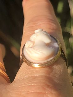 Antique Victorian genuine shell cameo 10 karat yellow gold size 7 10kt kt ring. This is an absolutely gorgeous Victorian ring with a beautifully carved lady. NOTE: Items in photographs may appear larger or smaller than actual size. Please make sure to check the item descriptions and all photographs carefully. Our items are mostly vintage or antique and will naturally show signs of age and wear. Coupons cannot be combined with sale items. One discount per order please. We ship all orders on the s Antique Rings Victorian, Silver Brooch Pin, Victorian Ring, Sterling Silver Brooch, Victorian Rings, Silver Brooch, Sunset Beach, Yellow Gold Ring, Ring Size 7