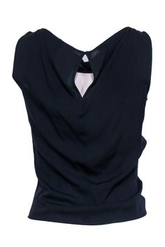 Escada has done it again with this sophisticated and casual tank top blouse. The casual drawstring detailing makes this a perfect match for your favorite pair of jeans. On the other hand, if you need to make this more professional, just adjust the drawstring and this transforms into an easy to style garment for work. Size XS/S 100% Silk Side zipper closure Keyhole back with single button Unlined Tank silhouette V-neckline Sleeveless Center front adjustable drawstring Bust 30" Waist 24" Shoulder Casual Sleeveless Viscose Top, Casual Viscose Sleeveless Blouse, Casual Sleeveless Viscose Blouse, Casual Viscose Sleeveless Blouse Tank Top, Casual Sleeveless Viscose Tank Top, Sleeveless Viscose Tops For Night Out, Casual Tank Blouse For Night Out, Casual Sleeveless Blouse For Night Out, Casual Cami Tops For Workwear