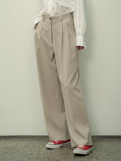 These muse two-tuck wide fit pants by Siyazu are stylish to pair with any regular fit top. For its loose fit and belted waist, it gives off a great balance to your fall looks. - Loose and standard fit silhouette - Cinched high-waist with zipper closure- Pin-tuck detail with pocket features Beige Wide Leg Pants With Belt Loops, Chic Beige Wide-leg Dress Pants, Chic Beige Wide Leg Dress Pants, Elegant Wide Leg Pants With Belt, Beige Wide Leg Pants For Work With Belt Loops, Neutral Wide-leg Pants With Belt Loops, Formal Beige Wide Leg Pants With Belt Loops, Elegant Belted Solid Wide Leg Pants, Elegant Solid Color Belted Wide Leg Pants