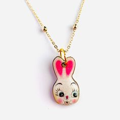 Hop into Easter with this playful bunny necklace by Rosie Rose Parker. With its cute and kitschy charm, celebrate the holiday in style. Perfect for adding a touch of quirky fun to your outfit. Quirky Pink Jewelry Gift, Quirky Pink Jewelry As A Gift, Cute Charm Necklaces For Gifts, Playful Handmade Charm Necklaces For Birthday, Playful Handmade Charm Necklace For Birthday, Playful Pink Jewelry For Easter, Playful Handmade Charm Necklaces For Gifts, Cute Handmade Easter Jewelry, Fun Handmade Charm Necklaces For Gifts