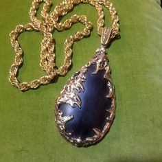 This is a very unique Vintage necklace from the 1960's.   It is gold tone costume jewelry.   The pendant is 4 3/4 inches long including the bail.   It has a black teardrop shaped stone. This is the same style pendant that the main character, Elaine wore in the movie "The Love Witch". The chain measures 30 inches and slips over the head. Thank you for taking the time to visit my shop and supporting my small business. The Black Cat Closet is a one-woman operation that has been around since 1999. P Cat Closet, The Love Witch, Witch Necklace, 1960's Fashion, Teardrop Pendant, 1960s Fashion, Main Character, Same Style, Statement Jewelry