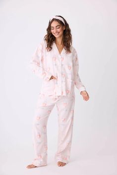 Love the wine you're with! Our iconic flannel PJ set is made of the softest 100% cotton flannel. It's a favorite for all the good reasons: easy fit, comfy shape, and all your favorite prints. This three-piece set features a classic button-up notch collar double pocket top and classic straight leg pants. 2-piece pajama set with pink rose' wine glass print Embroidered cuff "Rose all Day" Button-front top & tie waist pant FIT: True to Size Model is 5' 8", wearing size small FABRIC & CARE 100% Cotton - Twill Flannel Machine Wash Cold. Do Not Bleach. Tumble Dry Low. Imported Garter Belt Lingerie, Tie Waist Pants, Bamboo Pajamas, Flannel Pajamas, Notch Collar, Loungewear Sets, Plus Size Shopping, Pocket Top, Swim Dress