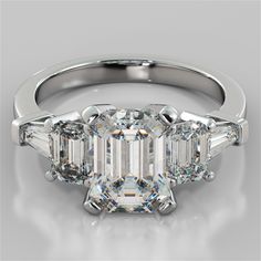 three stone diamond engagement ring with baguetts