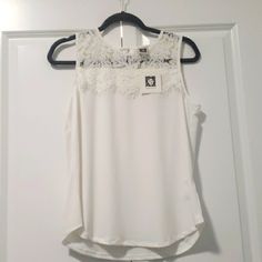 Brand New Anne Klein White Sleeveless Blouse, With A U-Neck And Lace Top. Elegant White Cami Vest, Chic Sleeveless Lace Top Camisole, Chic White Blouse Vest, White Tank Top For Summer Workwear, White Sleeveless Chic Blouse, Chic White Sleeveless Blouse, Feminine Lace Sleeveless Tank Top, White Sleeveless Tank Top For Work, Sleeveless Lace Tank Top For Spring