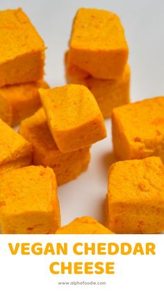 a pile of vegan cheddar cheese cubes