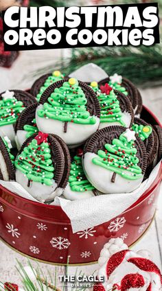 christmas oreo cookies in a red tin with green and white frosting on top