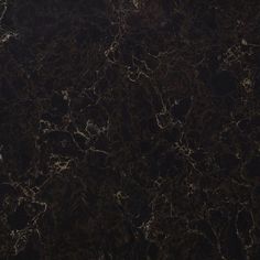 a black marble textured surface with dark colors