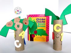 two children's crafts made out of toilet paper with the letters c and c on them