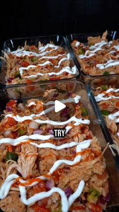 four trays filled with different types of food and the words try written on them